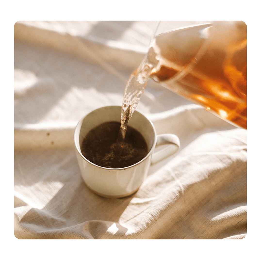 Menopause_Day_Tea_Getting_Poured.jpg - Roogenic